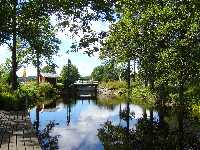 View downstream towards the lock from the upstream waiting bridge.