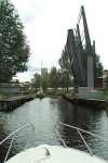 Entering the upper lock. The roadbridge is opened.