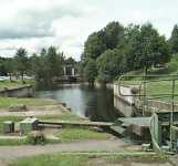 The roadbridge and the short canal seen from the top gate of the upper chamber.