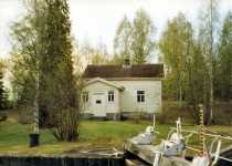 Canal keepers house is near the lock. Emptying mechanism of the lock chamber is visible.