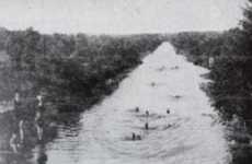 People swimming in the canal